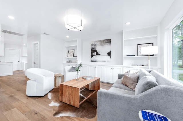 living room featuring light wood-type flooring