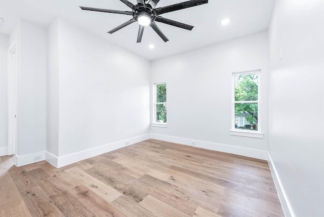 unfurnished room featuring ceiling fan and light hardwood / wood-style floors