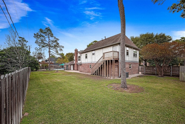 view of yard with a deck