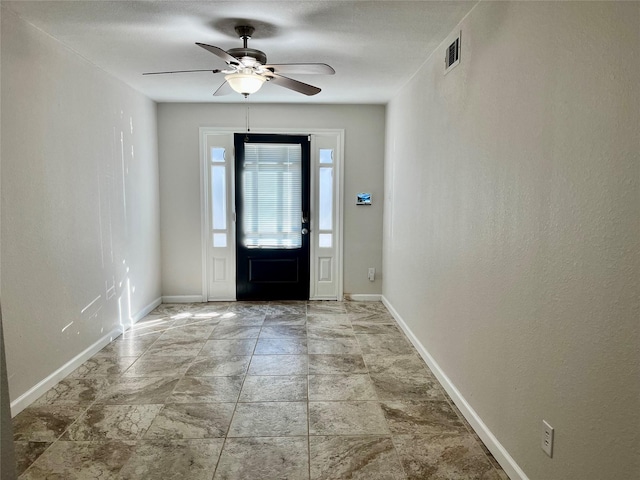 entryway with ceiling fan