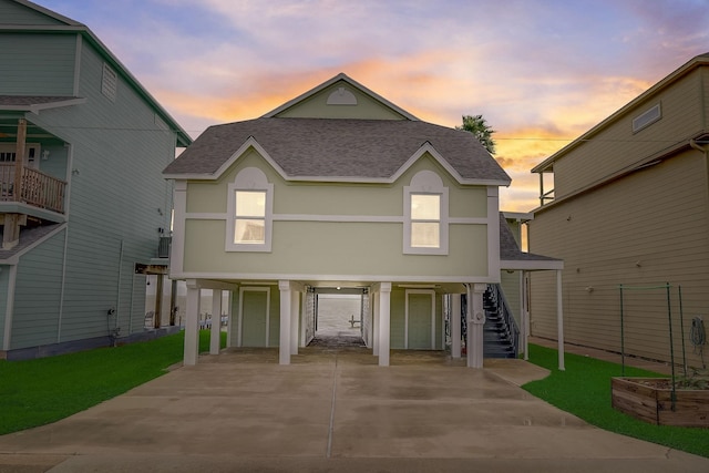 view of front of home with a yard