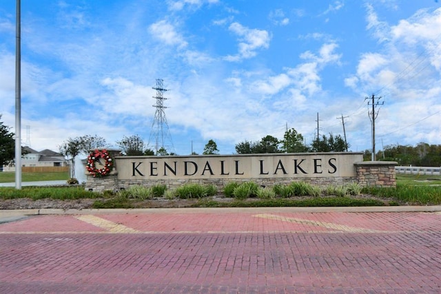 view of community sign