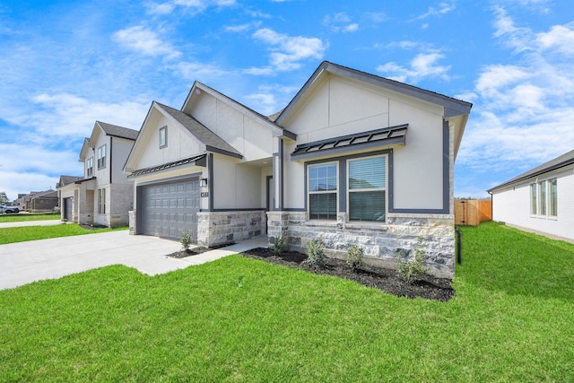 view of front of property with a garage and a front yard