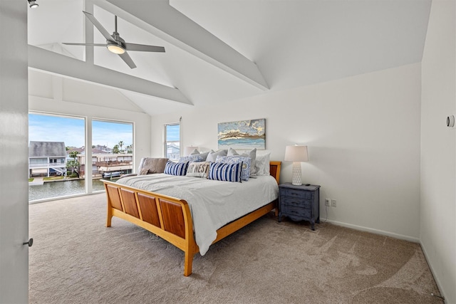 bedroom featuring access to exterior, carpet, ceiling fan, beam ceiling, and a water view