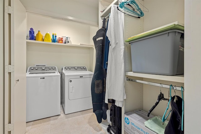 laundry room featuring washer and clothes dryer