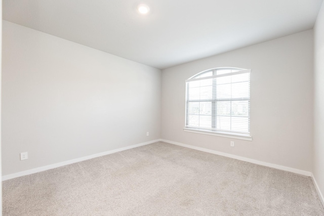 spare room with carpet flooring