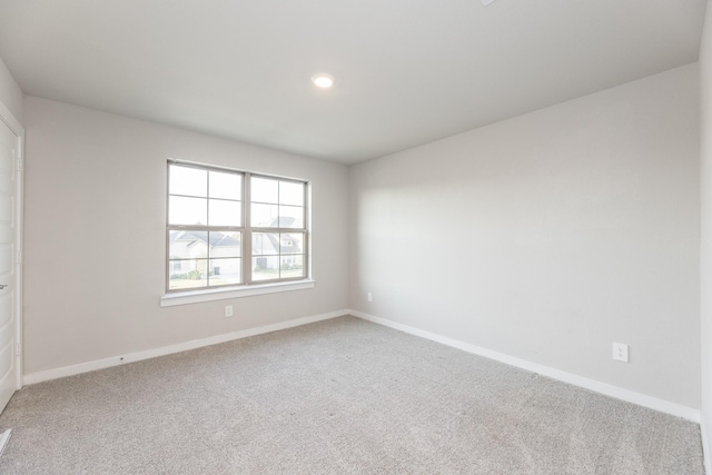 empty room featuring carpet flooring