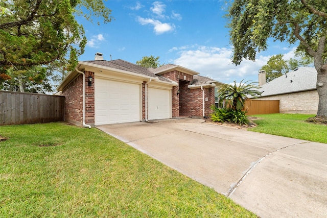 single story home featuring a garage and a front yard