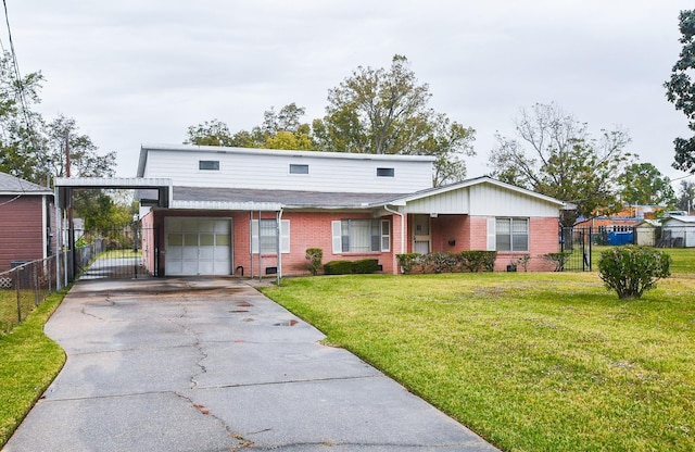 view of front of house featuring a garage and a front lawn