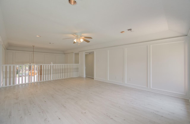 empty room featuring light hardwood / wood-style floors and ceiling fan