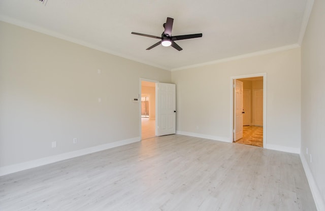 empty room with ceiling fan, ornamental molding, and light wood-type flooring