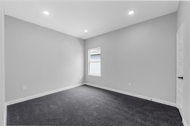 unfurnished room with carpet floors