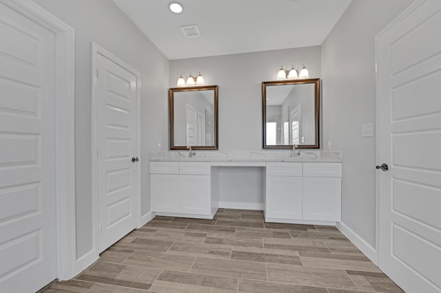 bathroom featuring vanity