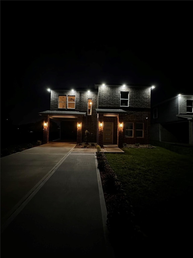 view of front of house with a yard