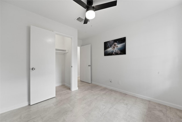 unfurnished bedroom featuring a closet and ceiling fan