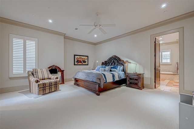 carpeted bedroom featuring connected bathroom, ceiling fan, and crown molding