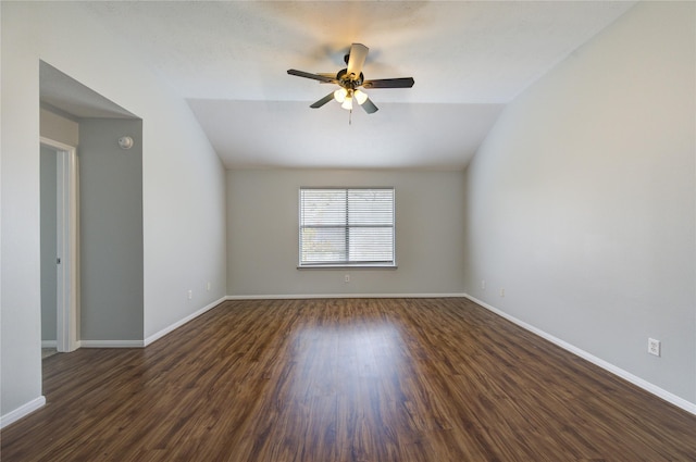 unfurnished room featuring ceiling fan, dark hardwood / wood-style floors, and lofted ceiling