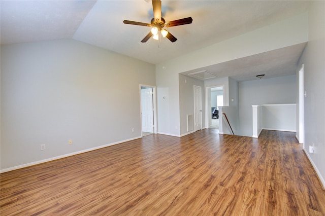 unfurnished room featuring ceiling fan, vaulted ceiling, and hardwood / wood-style flooring