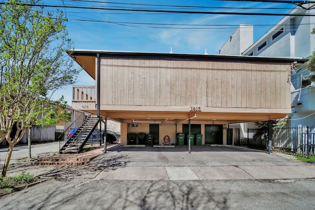 view of front facade with a carport