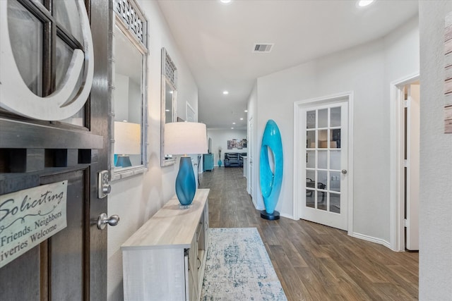 entrance foyer featuring dark hardwood / wood-style flooring