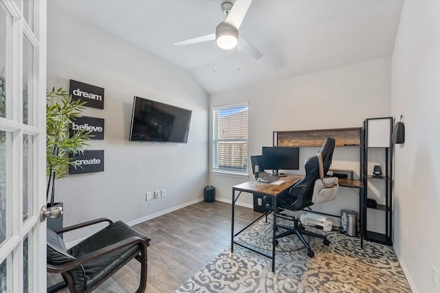 office space with hardwood / wood-style flooring, vaulted ceiling, and ceiling fan