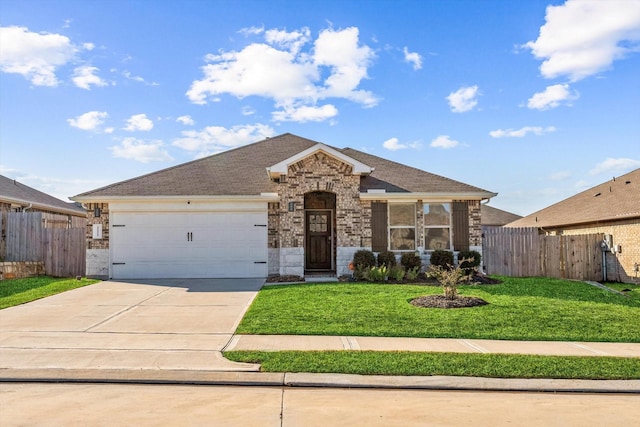 ranch-style home with a garage and a front lawn