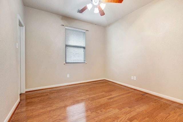 spare room with ceiling fan and light hardwood / wood-style flooring