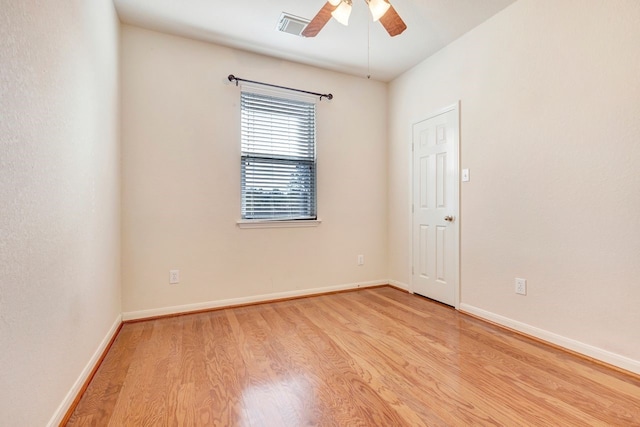 unfurnished room featuring ceiling fan and light hardwood / wood-style flooring