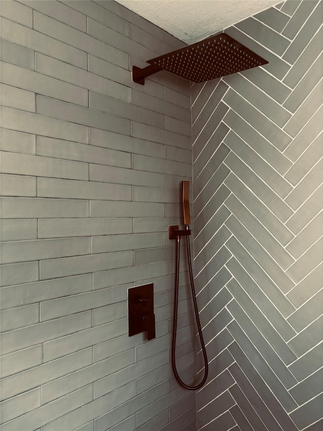 details with a tile shower