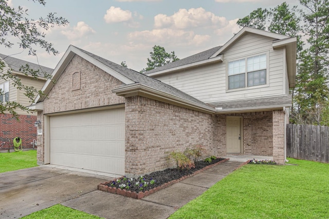 view of front facade featuring a front lawn and a garage