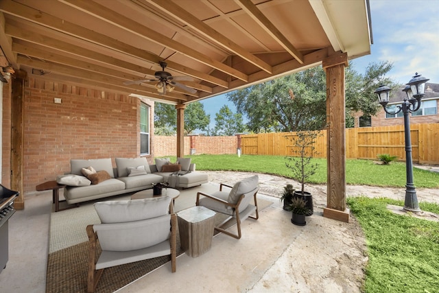 view of patio / terrace with ceiling fan and an outdoor hangout area