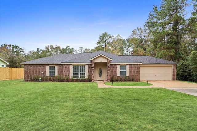 single story home with a garage and a front yard