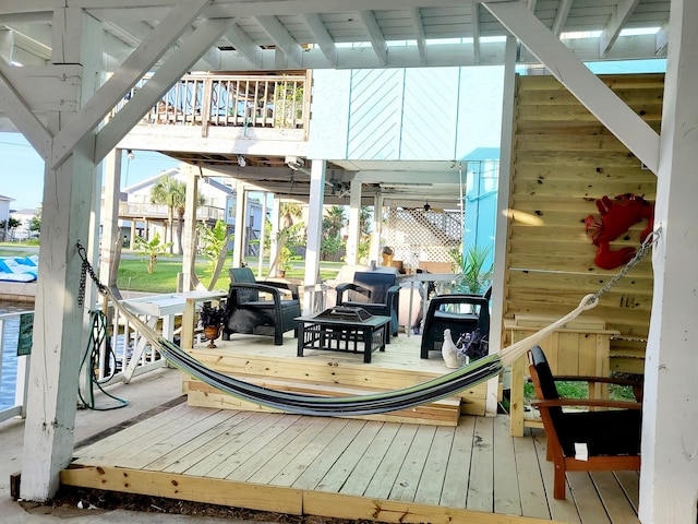 deck featuring an outdoor fire pit