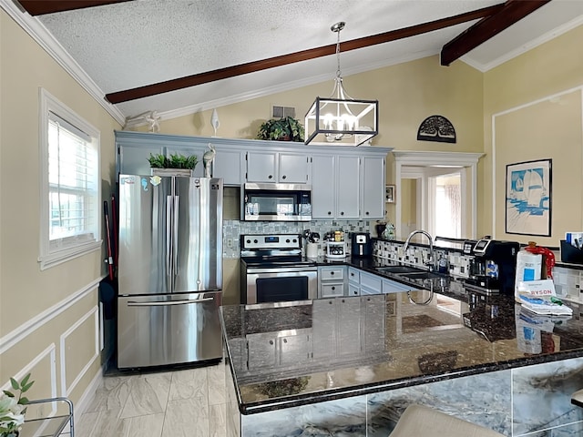 kitchen featuring appliances with stainless steel finishes, dark stone counters, a textured ceiling, sink, and vaulted ceiling with beams