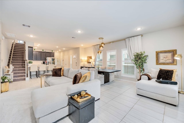 living room featuring light tile patterned flooring