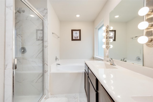 bathroom with shower with separate bathtub and vanity