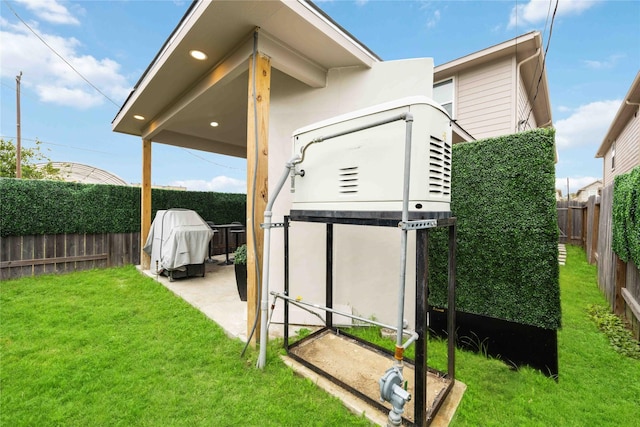 view of outbuilding featuring a lawn