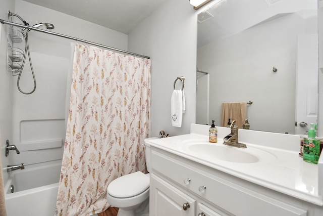 full bathroom featuring vanity, toilet, and shower / bath combo with shower curtain