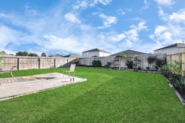 view of yard featuring a deck