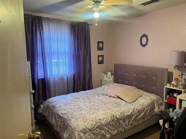bedroom featuring visible vents and a ceiling fan