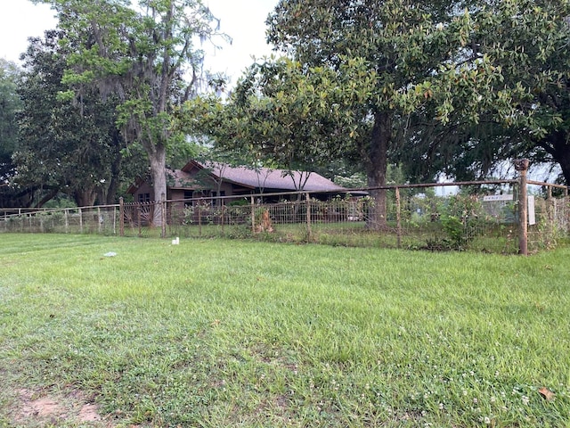 view of yard with fence