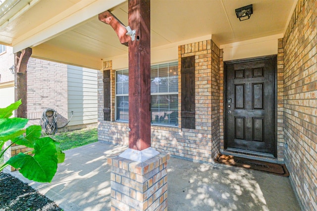 entrance to property with covered porch