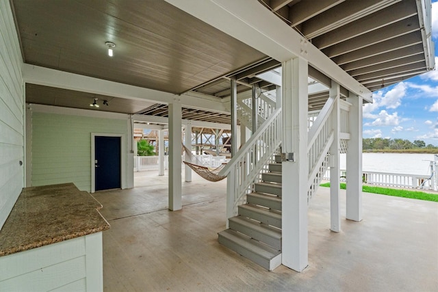 view of patio / terrace with a water view