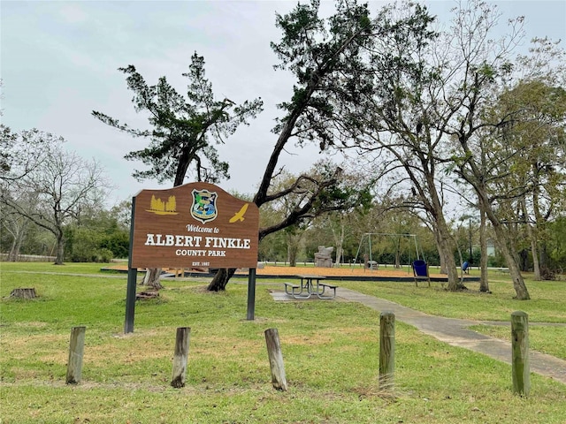 view of community featuring a yard