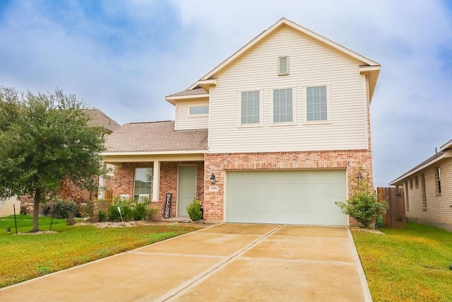 view of front facade with a garage and a front yard