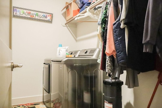 laundry room with separate washer and dryer