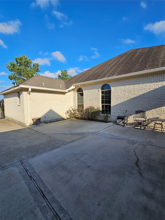 view of front of property featuring a patio