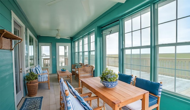 sunroom / solarium with ceiling fan