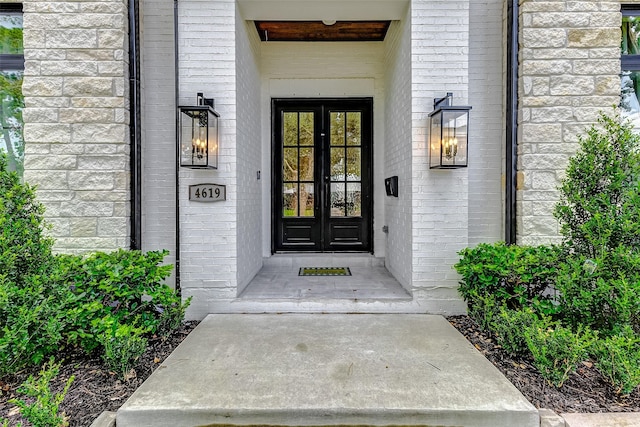 property entrance featuring french doors