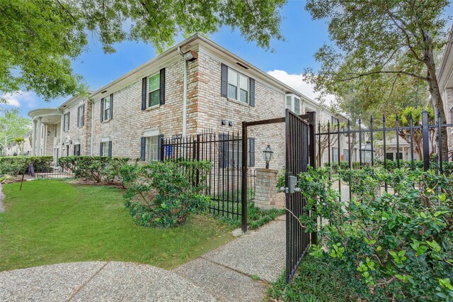 view of property exterior with a yard